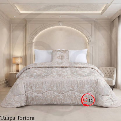 Trapunta/Piumone Tulipa in morbido raso jacquard con cuscino arredo coordinato
